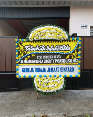 Papan Bunga Duka di Sanaman Mantikei